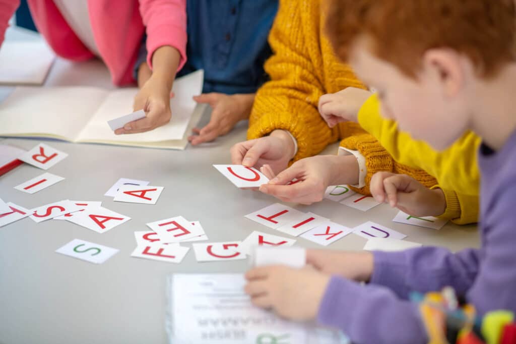 students playing partner games at literacy centers