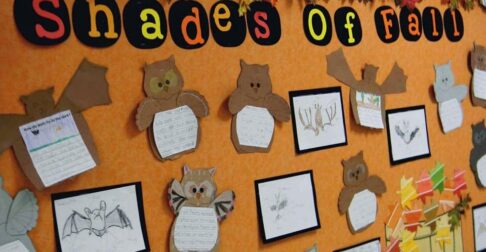 Shades of Fall bulletin board with orange background.