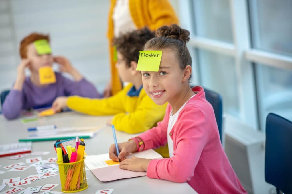 girl playing blends phonics game with sticky notes