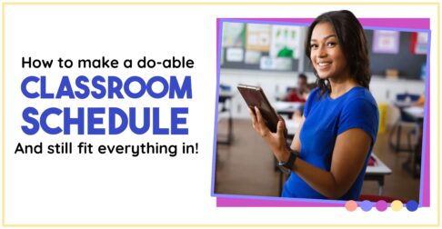 teacher in her classroom holding a tablet and checking her daily classroom schedule