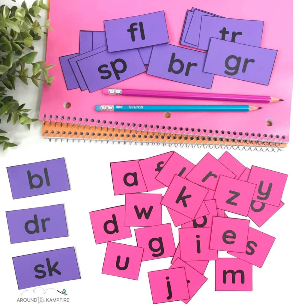 Pink and purple phonics word builder letter cards.